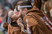 Kamchatka, Eastern Russia - An Indigenous Kamchatkan couple participate in a dance marathon that carries on through the night, lasting up to 16 hours. The dance moves imitate nature: Ravens, bears, gulls and especially Salmon.