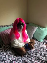Los Angeles, CA - "Honey" sitting on her bed. (Credit: National Geographic)