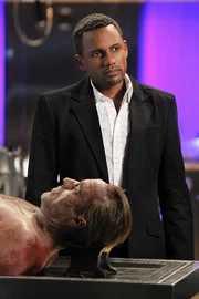 "Damned If You Do" -- Dr. Sheldon Hawkes (Hill Harper) with a man found beaten to death in his home.