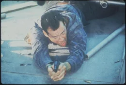 John McClane (Bruce Willis)