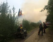 Bureau of Land Management firefighters keeping a close eye on the back burn. Bureau of Land Management firefighters keeping a close eye on the back burn.