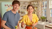Candid of Molly Yeh and her husband Nick making her Rose Cupcake Cones, as seen on Girl Meets Farm, Season 8. Candid of Molly Yeh and her husband Nick making her Rose Cupcake Cones, as seen on Girl Meets Farm, Season 8.