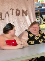 Amy, Tammy, and Michael spend a day at the local fair for a meet-and-greet with their fans.