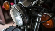 Detail with turn signal of a motorcycle.