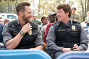 L-R: Frank Shaw (Joel McHale) and Fred 'Shred' Taylor(Michael Rowland)