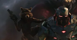 L-R: Rocket, James Rhodes / War Machine (Don Cheadle).