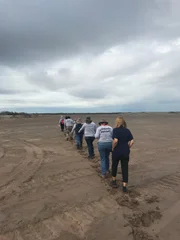 Sinaloa, Mexico - Mariana van Zeller walks with a group of women known as "Sabuesos Guerreras", as they search for their missing loved ones in the outskirts of Culiac&aacute;n, Sinaloa.