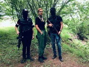 Sinaloa, Mexico - Mariana van Zeller (R) with sicarios, or hitmen, who are members of the Sinaloa Cartel.