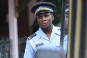 Officer J.P. Hooper (Tobi Bakare)
