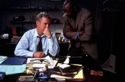 l-r: Captain James Deakins (Jamey Sheridan), Ron Carver (Courtney B. Vance)