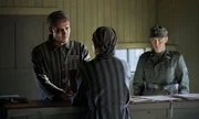 Jonah Hauer-King as Lali Sokolov & Jonas Nay as Nazi Officer Stefan Baretzki in Auschwitz.