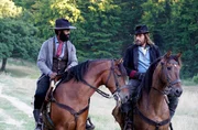l-r: John Ellis (Nicholas Pinnock), Django (Matthias Schoenaerts)