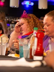 Tammy und Misty eat and drink at Tammy&rsquo;s 35th drag brunch birthday.