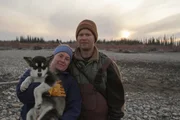 Tyler and Ashley holding Gwen in Alaska.