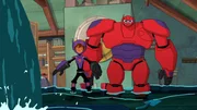 L-R: Hiro (voiced by Ryan Potter), Baymax (voiced by Scott Adsit)