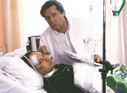 Dr. Stefan Frank (Sigmar Solbach) kann Armin Thaler (Michael Lott, lieg.) davon &uuml;berzeugen, seiner Frau reinen Wein einzuschenken. Er will ihr seine Liebe zu einem anderen Mann gestehen.