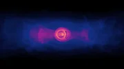 Dies ist eine Computersimulation zweier spiralf&ouml;rmiger supermassiver Schwarzer L&ouml;cher.