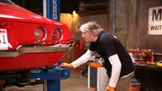 Edd works on the Camaro on the lift.