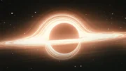 Das Bild zeigt eine k&uuml;nstlerische Darstellung einer schwarzen Lochumgebung, die von einer gl&uuml;henden Akkretionsscheibe umgeben ist.