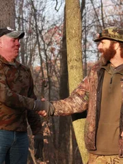 Wild Bill and Willy shaking hands after a good trap build.