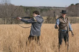 Columbus ( Jesse Eisenberg) and Tallahassee (Woody Harrelson) on the White House Lawn in Columbia Pictures' ZOMBIELAND: DOUBLE TAP.