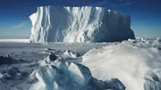 An Iceberg is surround by sea ice in the waters around Antarctica.