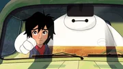 L-R: Hiro (voiced by Ryan Potter), Baymax (voiced by Scott Adsit)