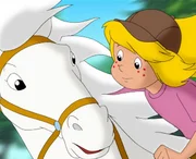 Bibi und ihr Pferd Sabrina sind unzertrennlich.