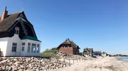 Die Strandvillen auf der Halbinsel Graswarder sind bei Sturmfluten immer wieder immer wieder in Gefahr.