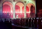 Colour image shows the gathering of the annual midnight swearing-in of Nazi SS troops. Feldherrnhalle, Munich 1938. (Photo by: Universal History Archive/UIG via Getty Images)