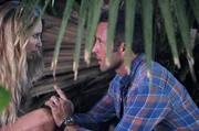 From left, Lynn Downey (Sarah Carter) and Steve McGarrett (Alex O'Loughlin).