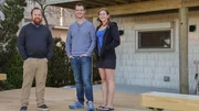 Real estate agent "Red" Ryan Lowrie poses for a photo with homebuyers Ryan and Samantha after touring the Beach Path House, as seen on HGTV's Beach Hunters.