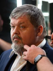 Chris gets fitted for a new suit after his weight loss. Chris gets fitted for a new suit after his weight loss.