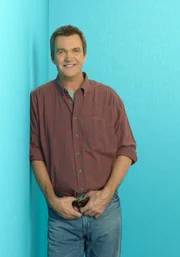 Mike Heck (Neil Flynn)