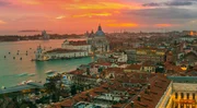 View of Basilica di Santa Maria della Salute at night under very dramatic sunset,Venice, Italy