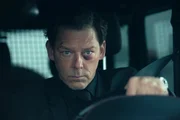 Richard Coyle als Reagan