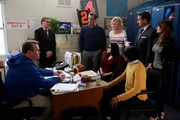 L-R: Cameron (Eric Stonestreet), Principal Brown (Andrew Daly), Phil (Ty Burrell), Alex (Ariel Winter), Claire (Julie Bowen), Sanjay (Suraj Partha), Vish Patel (Ajay Mehta), Nina Patel (Anjali Bhimani)
