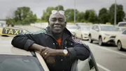 Ciss&eacute; mit seinem Taxi.