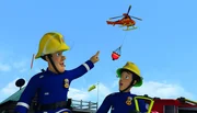Fireman Sam and fireman Elvis Cridlington    helped by the helicopter