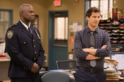On left: Captain Holt (Andre Braugher) and on right Jake (Andy Samberg)