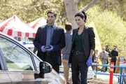 Frankie Rizzoli Jr. (Jordan Bridges, l.); Jane Rizzoli (Angie Harmon, r.)