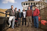 The crew of the Time Bandit on the deck of the Time Bandit in Dutch Harbor Alaska.