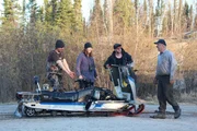 Stephan, Allyce, Ryna and 2 Males examine the snow ski.