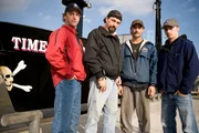 The Hillstrand family in front of the Time Bandit in Dutch Harbor, Alaska. Left to right: Andy, Johnathan, Neal, and Scotty.