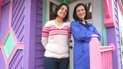 As seen on Tiny House Hunters, buyer Nicki (left) and agent Mary outside of a bright tiny house outside Savannah, GA.