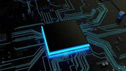 Das Bild zeigt einen Computerchip auf einer Leiterplatte (PCB) mit leuchtenden Spuren, die die elektrischen Verbindungen darstellen.