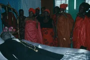 Ghana, Accra, Funeral Of Man From The Ga Community. His Wife Talks To Her Dead Husband As Is Customary During The Wake.