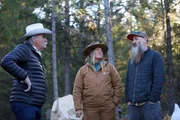 Marty Raney, Misty Bilodeau, and Matt Raney discussing their concerns and plans for Doug Shelby's homestead in Trego, Montana.
