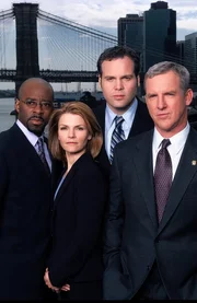 L-R: Ron Carver  (Courtney B. Vance), Detective Alexandra Eames (Kathryn Erbe), Detective Robert Goren (Vincent D'Onofrio), Captain James Deakins (Jamey Sheridan)