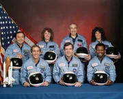 In the back row from left to right: Ellison S. Onizuka, Sharon Christa McAuliffe, Greg Jarvis, and Judy Resnik. In the front row from left to right: Michael J. Smith, Dick Scobee, and Ron McNair. In the back row from left to right: Ellison S. Onizuka, Sharon Christa McAuliffe, Greg Jarvis, and Judy Resnik. In the front row from left to right: Michael J. Smith, Dick Scobee, and Ron McNair.